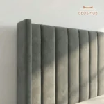 The Elara Wingback Ottoman Storage Bed